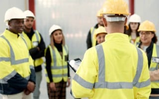 Safety Meeting at Rockytop Construction before parking garage cleaning project for a client.